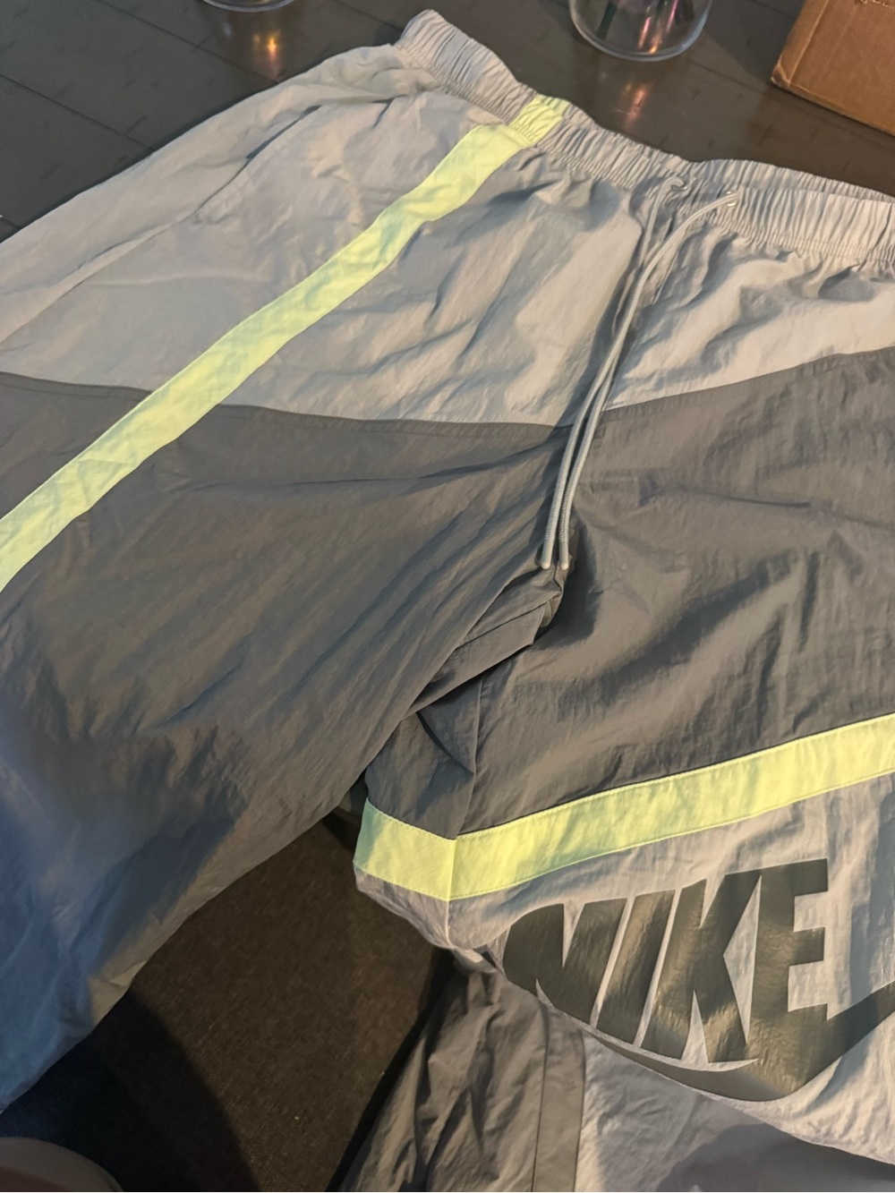 Nike woman’s  Gray Athletic Shorts with Reflective Lime Stripe